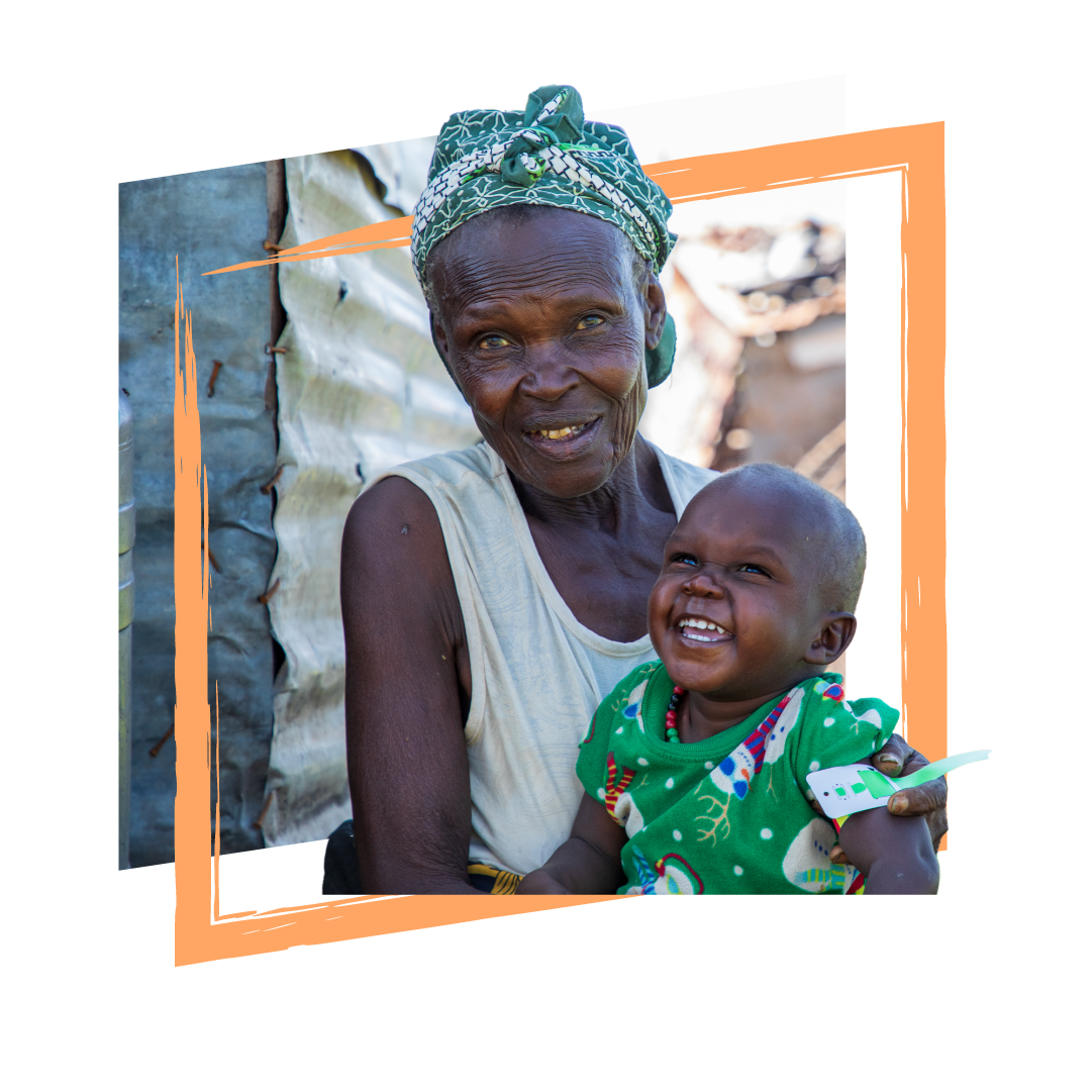 Kenyan woman with green head wrap holding laughing baby while administering a MUAC tape to his upper arm to test for malnutrition